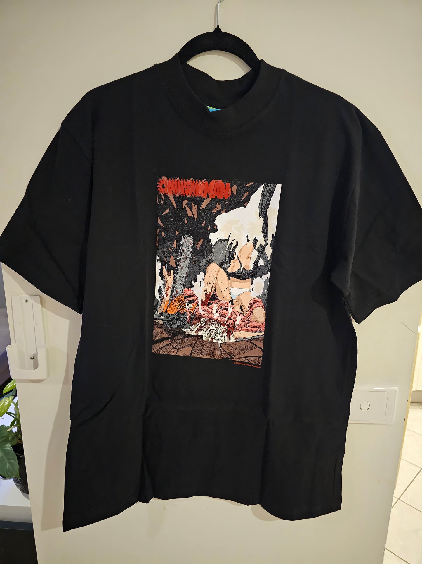 L Bomb Vs Chainsaw Tee